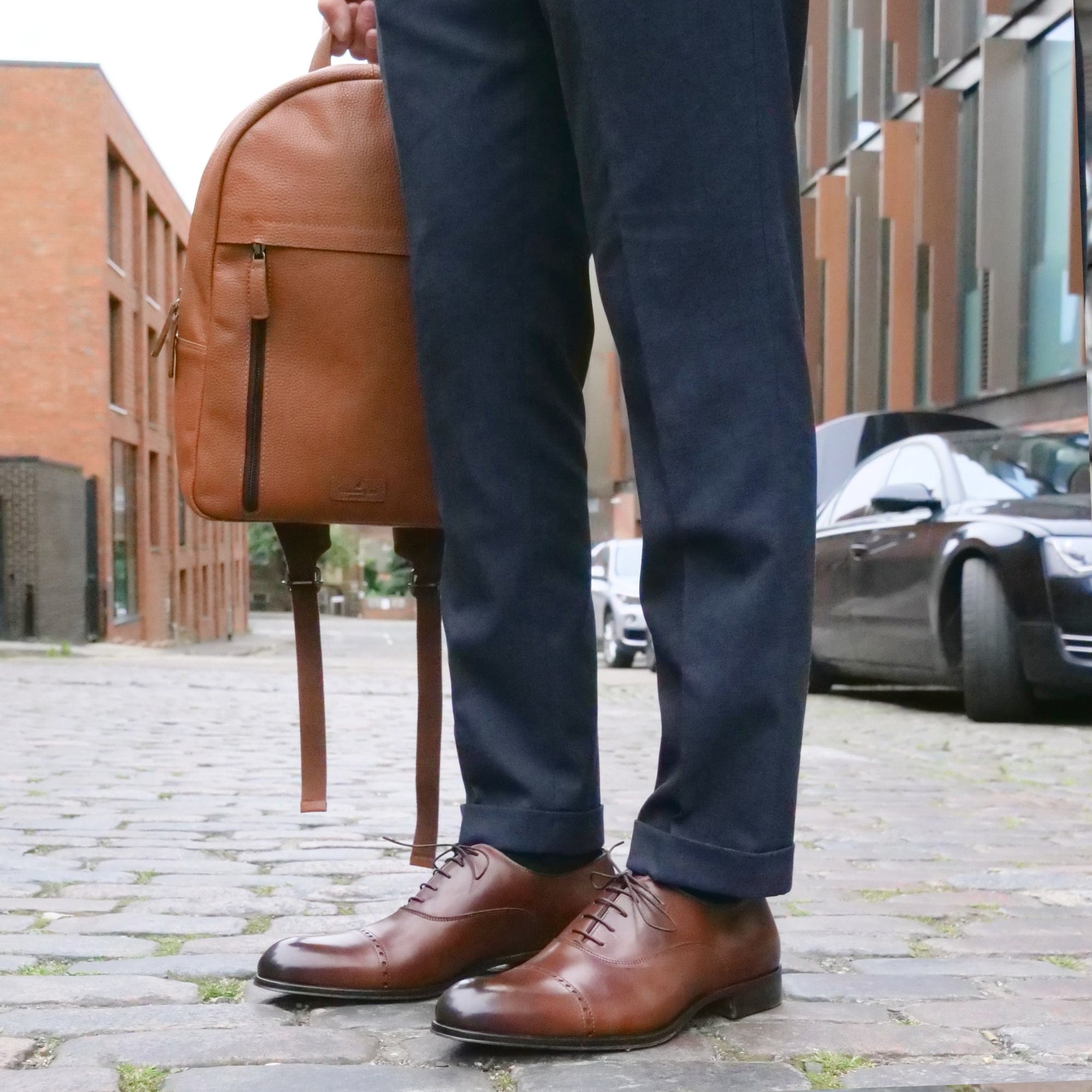 brown leather backpack with black shoes Leather Backpack Tan | Thomas Bird