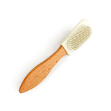 Wooden brush with bristle head on a white background